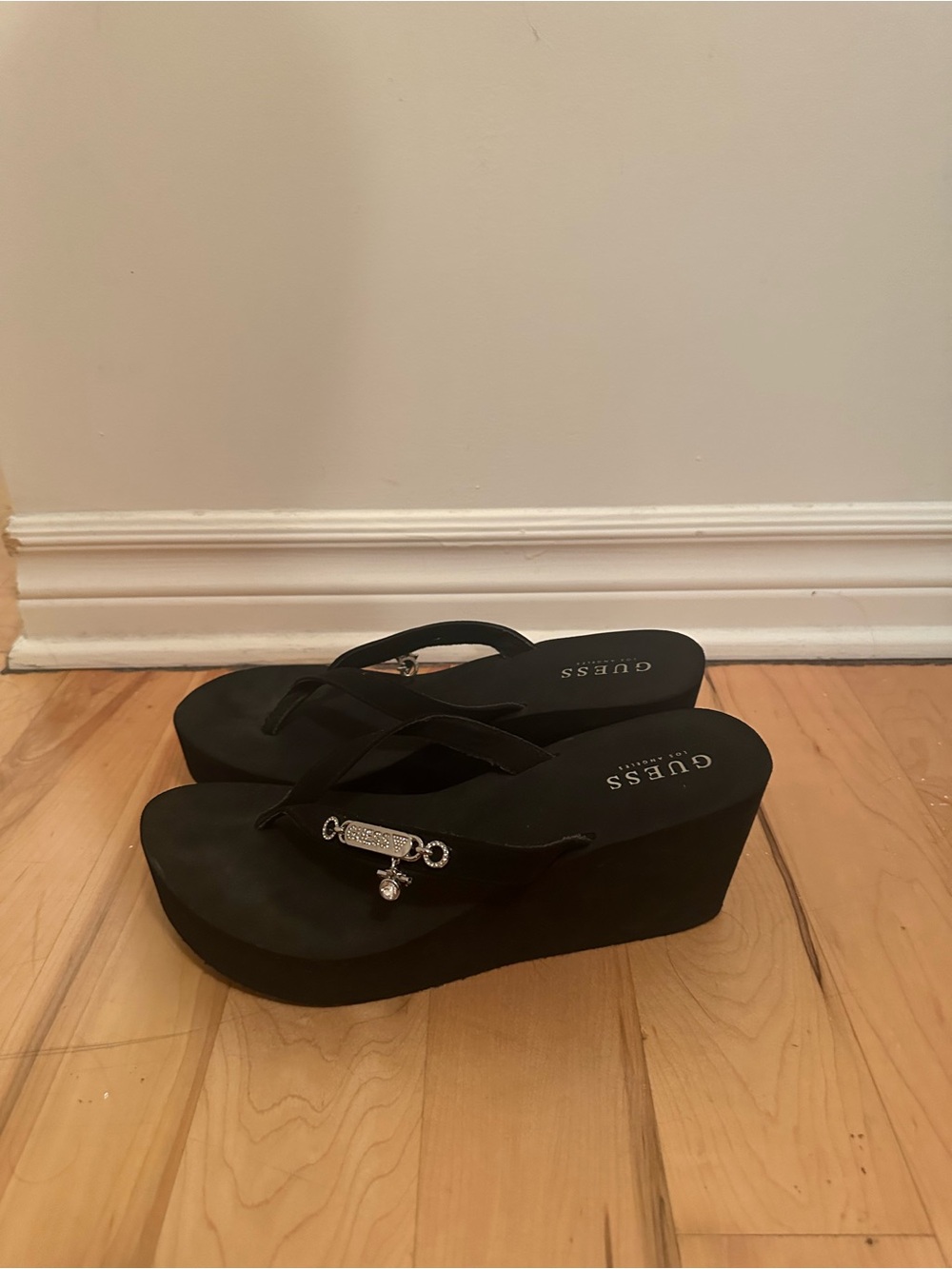 GUESS Black Wedge Flip-Flop Sandals with Silver Charm
